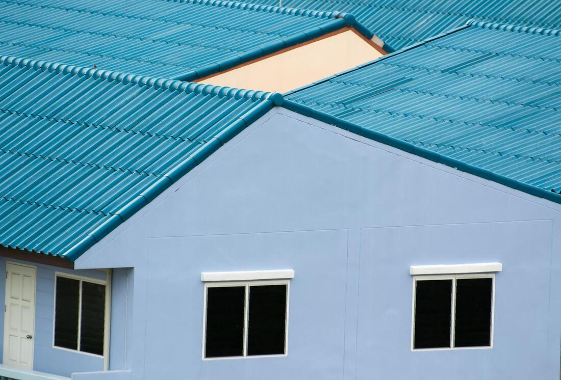 a blue commercial roof